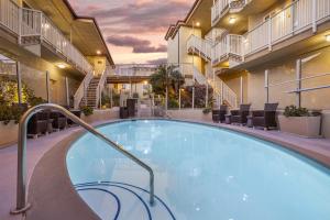 a large swimming pool in the middle of a building at Best Western Plus Beach View Lodge Carlsbad in Carlsbad