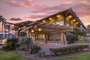 a rendering of a house with a pergola at Best Western Plus Beach View Lodge Carlsbad in Carlsbad