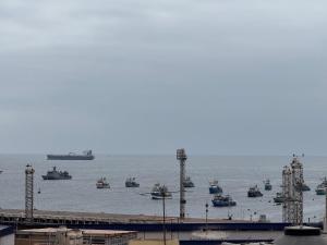 a group of boats sitting in the water at HOTEL CASA REAL Tacna in Tacna