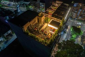 an overhead view of a building with plants on it at Hashtag 98 Hotel By Jalo in Medellín