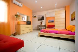 Posteľ alebo postele v izbe v ubytovaní B&B del Lungomare