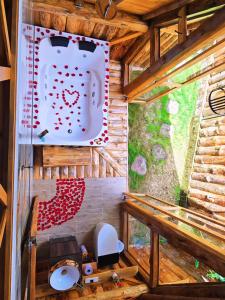 an outside view of a bathroom in a tree house at Quinta La Primavera Ecolodge in Isnos +10 photos