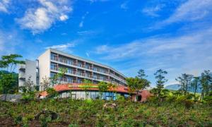 a building on the side of a hill at Belle Fore Resort in Jeungpyeong