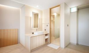 a bathroom with a sink and a mirror at Belle Fore Resort in Jeungpyeong +33 photos