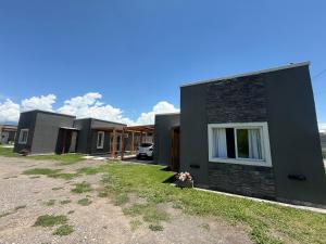 a row of modular homes in a row at Las Magnolias CABAÑAS in Salta