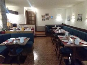 Restavracija oz. druge možnosti za prehrano v nastanitvi Garnì BUCANEVE
