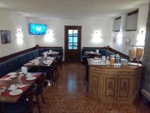 Restavracija oz. druge možnosti za prehrano v nastanitvi Garnì BUCANEVE