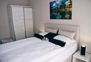Postel nebo postele na pokoji v ubytování Hotel Bakarni Lonac