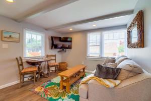 a living room with a couch and a table at Bette's Bungalow in San Diego