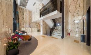 a lobby with people sitting at a table in a building at Dobong Hotel Bay204 in Seoul