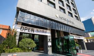 a building with an open sign on the front of it at Dobong Hotel Bay204 in Seoul +31 photos