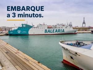 a large ship is docked in a harbor at HOSTAL LETTO DAL MARE in Valencia