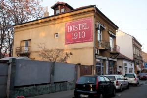 a building with a sign that reads hostel at Hostel 1910 in Belgrade
