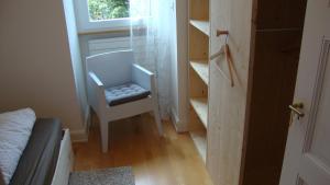 Rúm í herbergi á B&B Laupenring, Basel