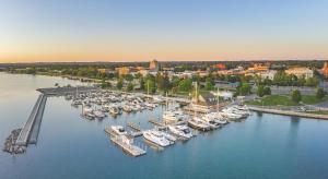 an aerial view of a marina with boats in the water at 539 Bay St ⁀➷ 3BDR Lake View Penthouse Condo on West Bay ➠ 401W in Traverse City +175 photos