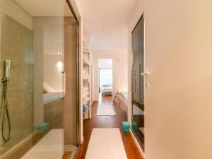 a bathroom with a shower and a walk in closet at Elegant villa with pool in Senigallia +33 photos