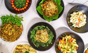 a table topped with plates of different foods at Pohang Hotel La Terrace in Pohang