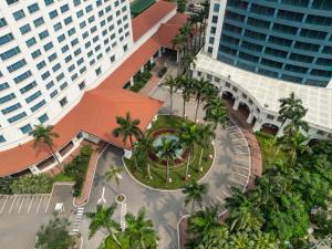 an overhead view of a courtyard in a city with tall buildings at Hanoi Daewoo Hotel in Hanoi