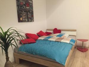מיטה או מיטות בחדר ב-Apartment Maasheuvel