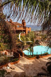 an aerial view of a house with a swimming pool at Casa Lucia in Palm-Mar