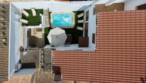 an overhead view of a house with a red roof at Ca Na Margalida in Muro