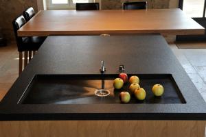 a table with apples on top of it at A charming Provençal farmhouse in Mouriès