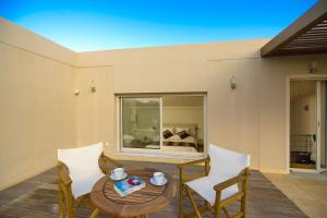 A seating area at Legrena Beach Villa
