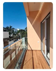 a balcony with a view of the ocean at 46 Elite Enclave in Nashik