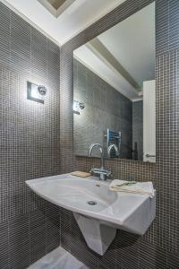 A bathroom at Legrena Beach Villa