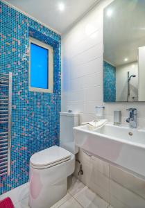A bathroom at Legrena Beach Villa