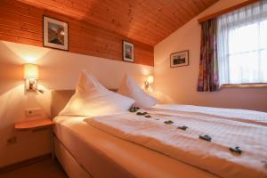 Postel nebo postele na pokoji v ubytování Appartements Millinger