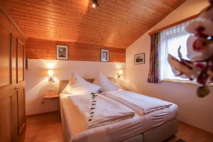 Postel nebo postele na pokoji v ubytování Appartements Millinger