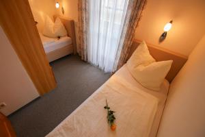 Postel nebo postele na pokoji v ubytování Appartements Millinger
