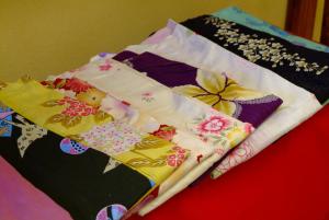Letto o letti in una camera di Mitake