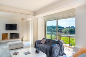 A seating area at Legrena Beach Villa