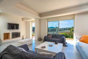 A seating area at Legrena Beach Villa