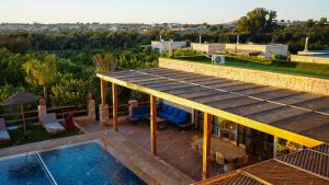 an overhead view of a house with a swimming pool at Dar Eddihi Essaouira in Essaouira +44 photos