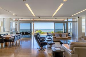 a living room with a view of the ocean at Number 10 I Private Properties in Dunsborough