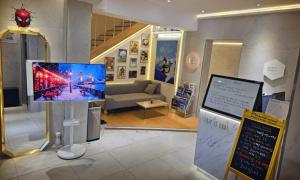 a room with a tv on a stand in a museum at Pohang Villa Dahlia in Pohang