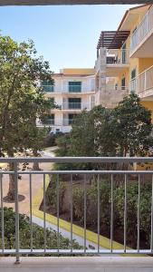 a view from a balcony of a building at Vozinha Residence in Prainha
