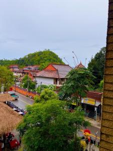 a city with a street and a town with trees and buildings at Adventure Studio Aonang in Ao Nang Beach