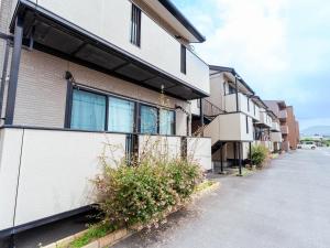 a building with some plants on the side of it at 2026APR NEW Open! SETOUCHI BLUE BASE in Utazu