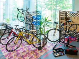 a group of bikes are parked in a room at 汐の丸 in Imabari