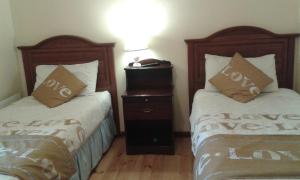 Postel nebo postele na pokoji v ubytování Achill West Coast House