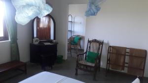 Postel nebo postele na pokoji v ubytování KANDY Holiday Residence
