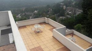 Balkón nebo terasa v ubytování KANDY Holiday Residence