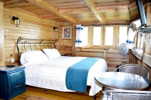Postel nebo postele na pokoji v ubytování Cabañas el Chalet