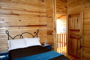 Postel nebo postele na pokoji v ubytování Cabañas el Chalet