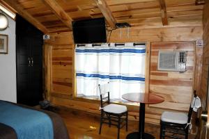 Postel nebo postele na pokoji v ubytování Cabañas el Chalet