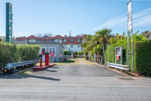 an empty street in front of a building at Wonderful chalet in De Haan in De Haan